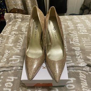 Katy Perry gold metallic pumps